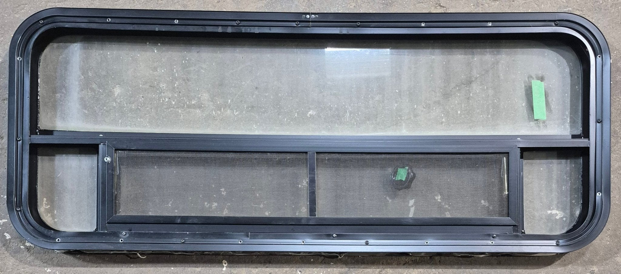 Used Black Radius Opening Window : 45 1/4" W x 17 1/4" H x 1 7/8" D - Young Farts RV Parts