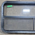 Used Black Radius Opening Window : 45 1/4" W x 21 1/4" H x 1 7/8" D - Young Farts RV Parts