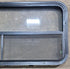 Used Black Radius Opening Window : 45 1/4" W x 21 1/4" H x 1 7/8" D - Young Farts RV Parts