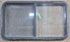 Used Black Radius Opening Window : 45 1/4" W x 25 1/4" H x 1 7/8" D - Young Farts RV Parts