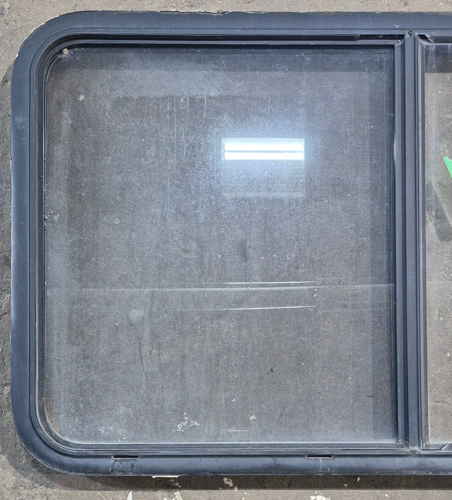 Used Black Radius Opening Window : 45 1/4" W x 25 1/4" H x 1 7/8" D - Young Farts RV Parts