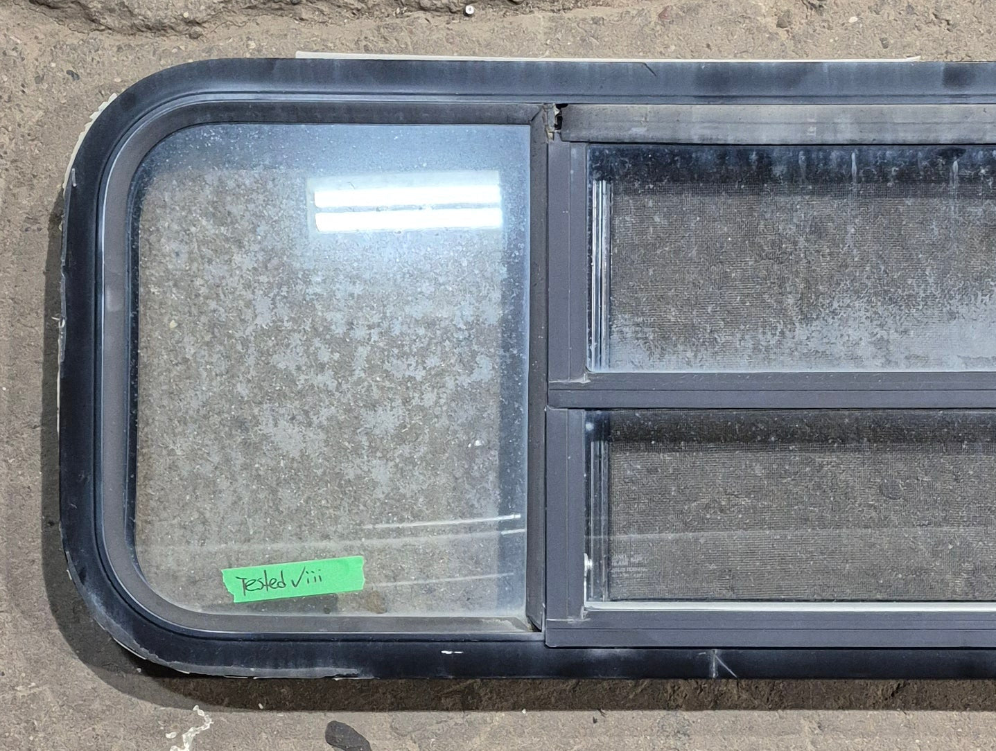 Used Black Radius Opening Window : 47 1/2" W x 14 3/4" H x 1 3/4" D - Young Farts RV Parts