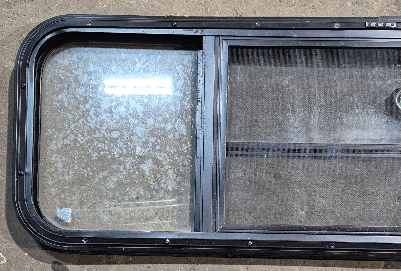 Used Black Radius Opening Window : 47 1/2" W x 14 3/4" H x 1 3/4" D - Young Farts RV Parts