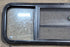 Used Black Radius Opening Window : 47 1/2" W x 14 3/4" H x 1 3/4" D - Young Farts RV Parts