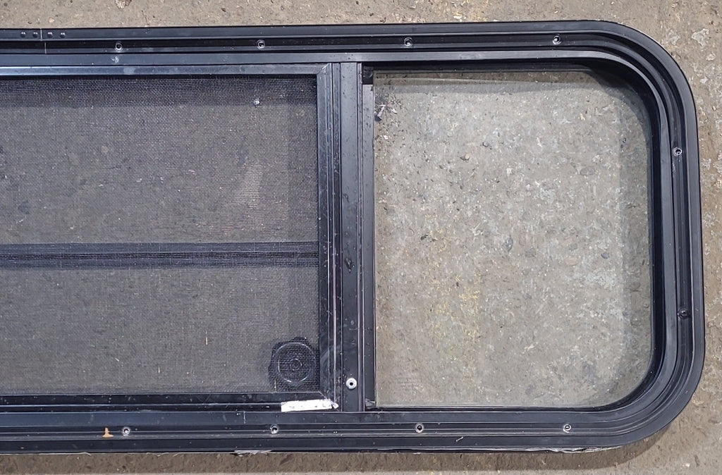 Used Black Radius Opening Window : 47 1/2" W x 14 3/4" H x 1 7/8" D - Young Farts RV Parts