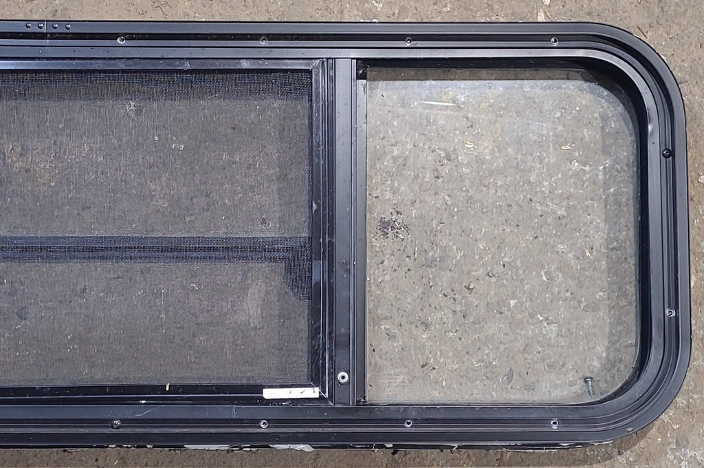 Used Black Radius Opening Window : 47 1/2" W x 14 3/4" H x 1 7/8" D - Young Farts RV Parts