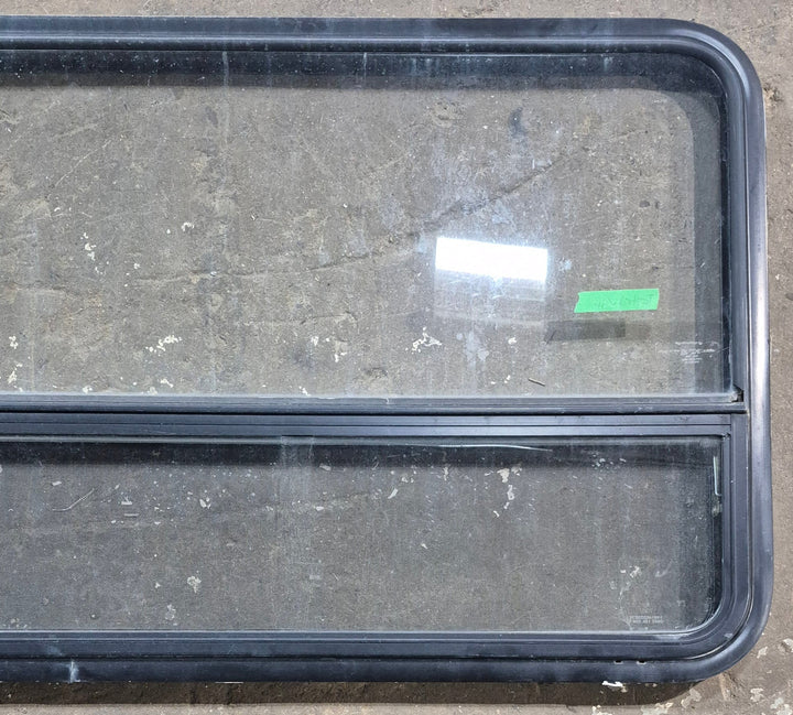 Used Black Radius Opening Window : 47 1/2" W x 28 1/4" H x 1 1/4" D - Young Farts RV Parts