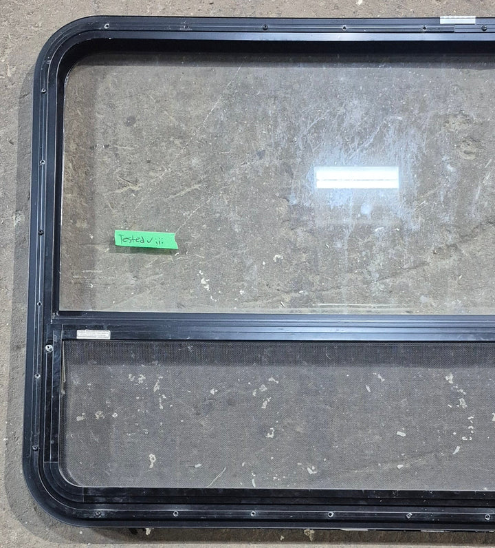Used Black Radius Opening Window : 47 1/2" W x 28 1/4" H x 1 1/4" D - Young Farts RV Parts