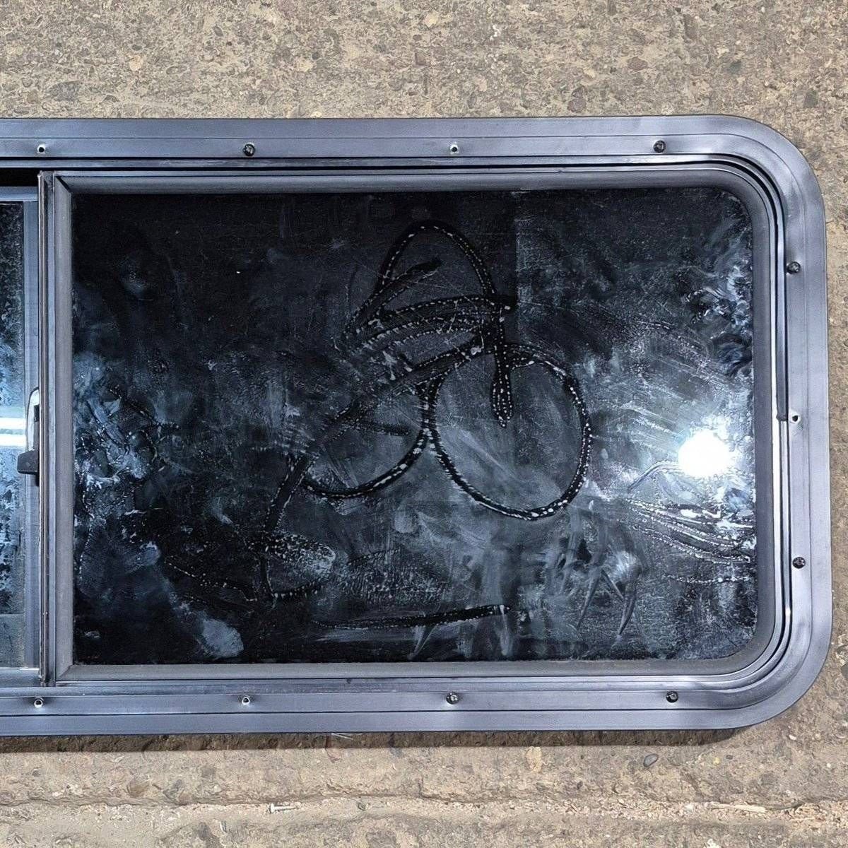 Used Black Radius Opening Window - 47 1/2