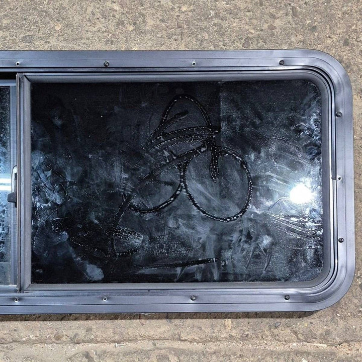 Used Black Radius Opening Window - 47 1/2" X 17 1/2" X 1 7/8" - Young Farts RV Parts