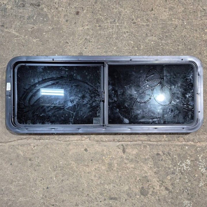Used Black Radius Opening Window - 47 1/2" X 17 1/2" X 1 7/8" - Young Farts RV Parts