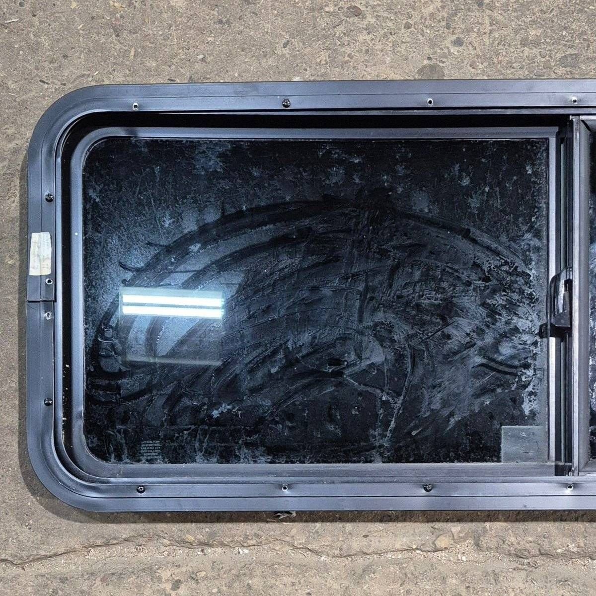 Used Black Radius Opening Window - 47 1/2" X 17 1/2" X 1 7/8" - Young Farts RV Parts