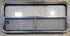 Used Black Radius Opening Window : 47 1/4" W x 21 1/4" H x 1 7/8" - Young Farts RV Parts