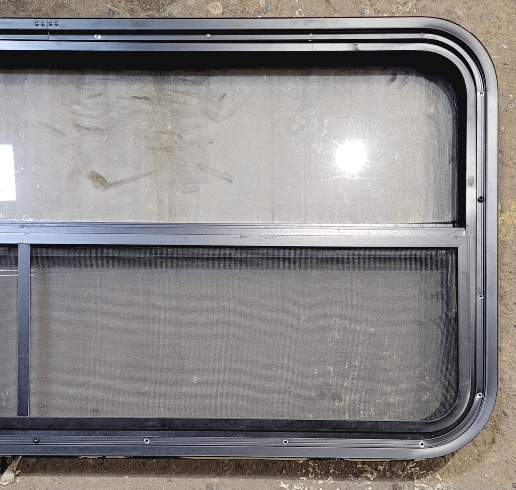 Used Black Radius Opening Window : 47 1/4" W x 21 1/4" H x 1 7/8" - Young Farts RV Parts