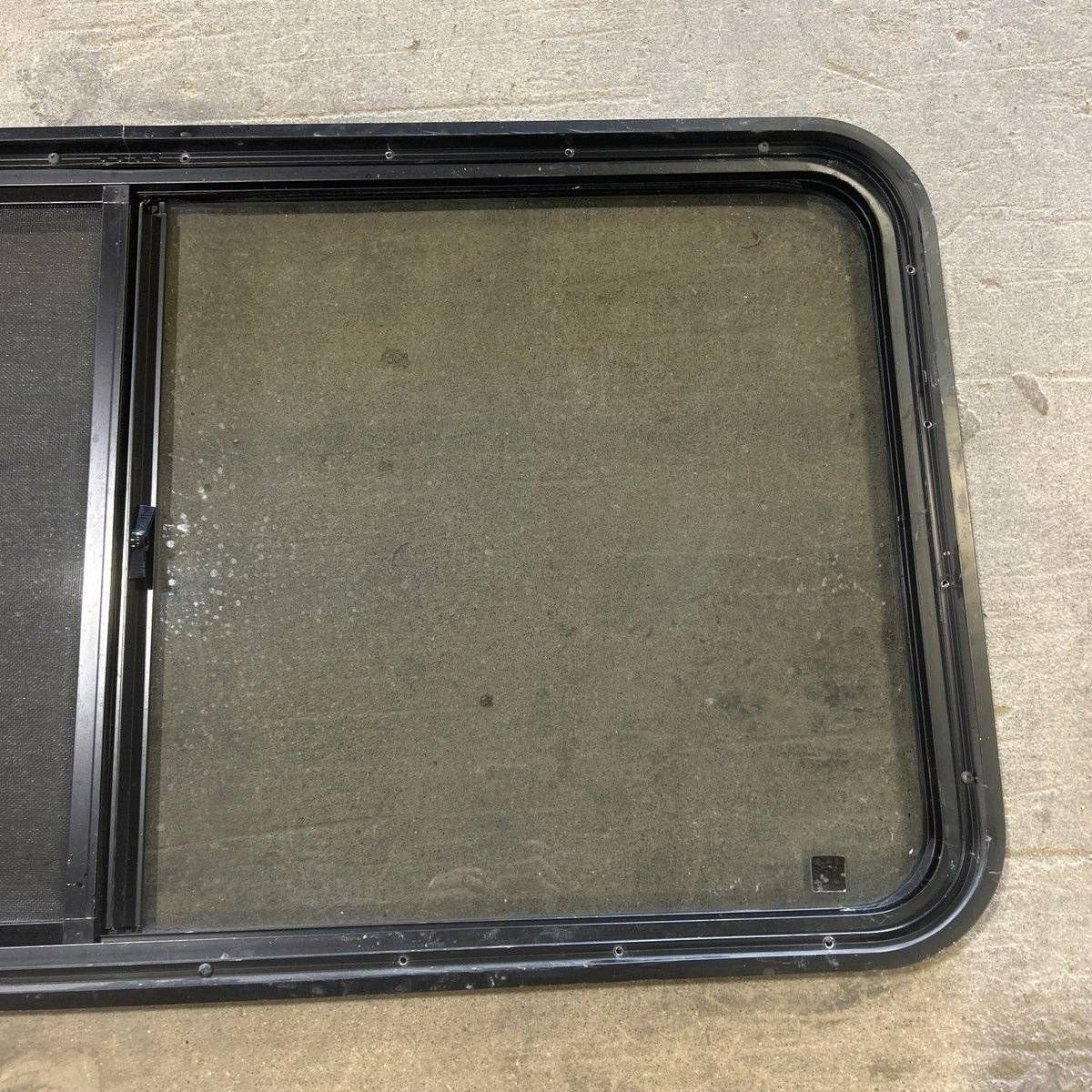 Used Black Radius Opening Window - 47.75 X 24.75 X 1.875 - Young Farts RV Parts