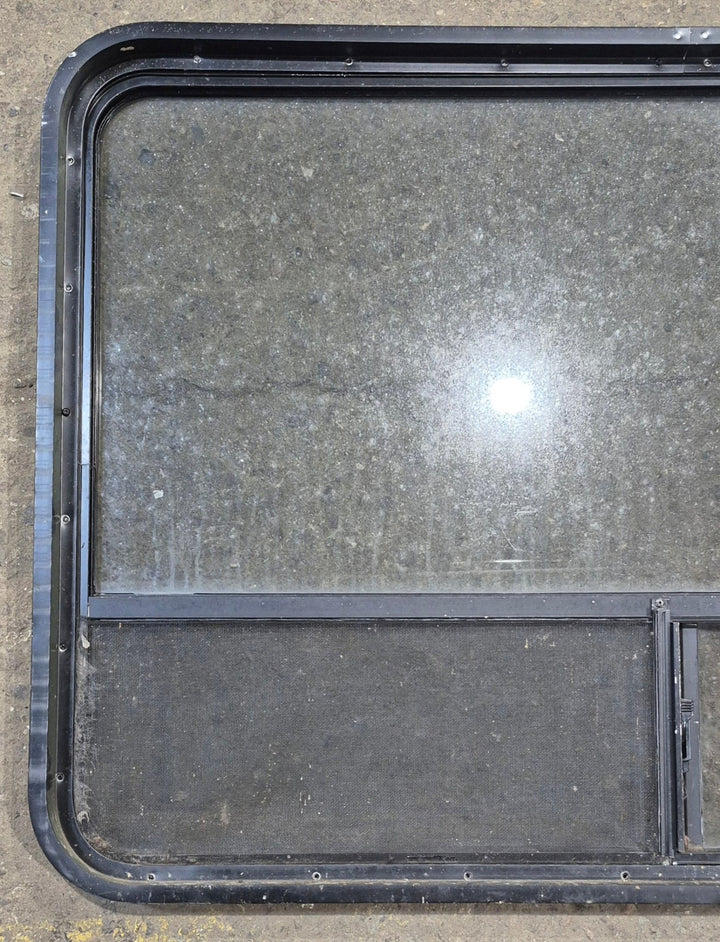 Used Black Radius Opening Window : 48 1/4" W x 31 3/4" H x 1 7/8" - Young Farts RV Parts