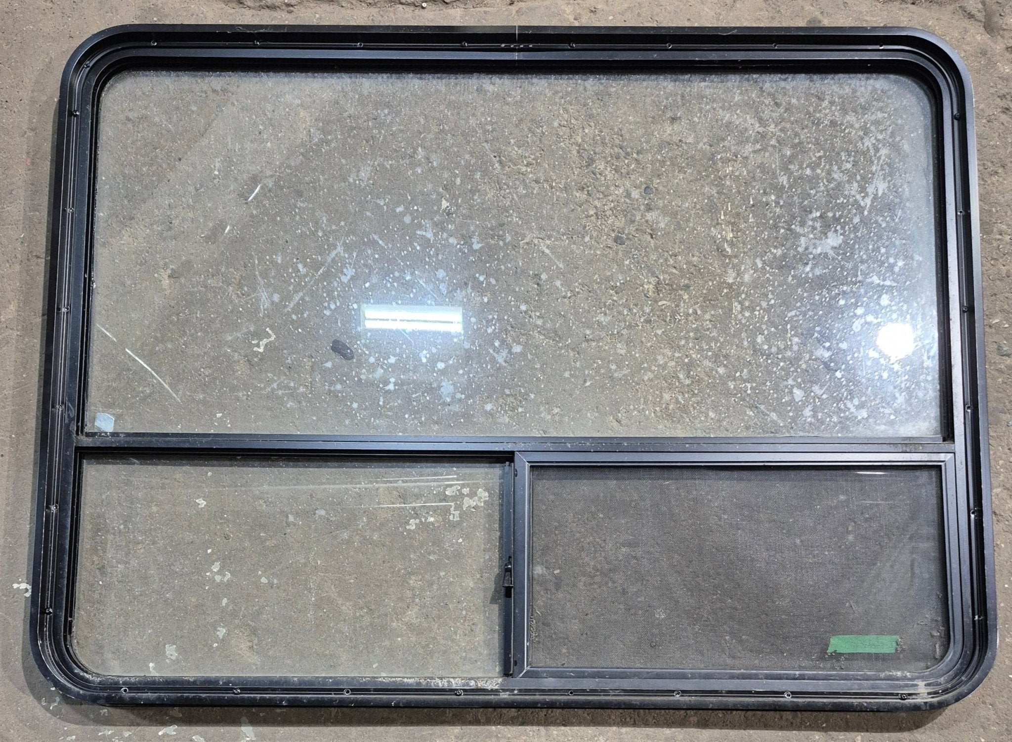 Used Black Radius Opening Window : 48 1/4" W x 35 3/4" H x 1 5/8" D - Young Farts RV Parts