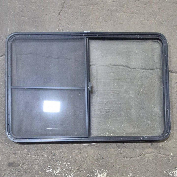 Used Black Radius Opening Window - 53 1/2" X 35 1/2" X 1 1/4" - Young Farts RV Parts