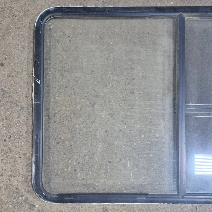 Used Black Radius Opening Window - 53 1/2" X 35 1/2" X 1 1/4" - Young Farts RV Parts