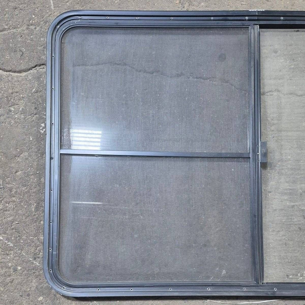 Used Black Radius Opening Window - 53 1/2" X 35 1/2" X 1 1/4" - Young Farts RV Parts