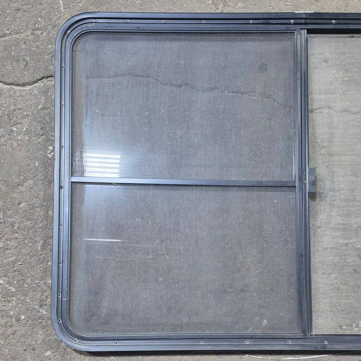 Used Black Radius Opening Window - 53 1/2" X 35 1/2" X 1 1/4" - Young Farts RV Parts