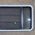 Used Black Radius Opening Window - 53 1/8" X 21 1/4" X 1 7/8" - Young Farts RV Parts
