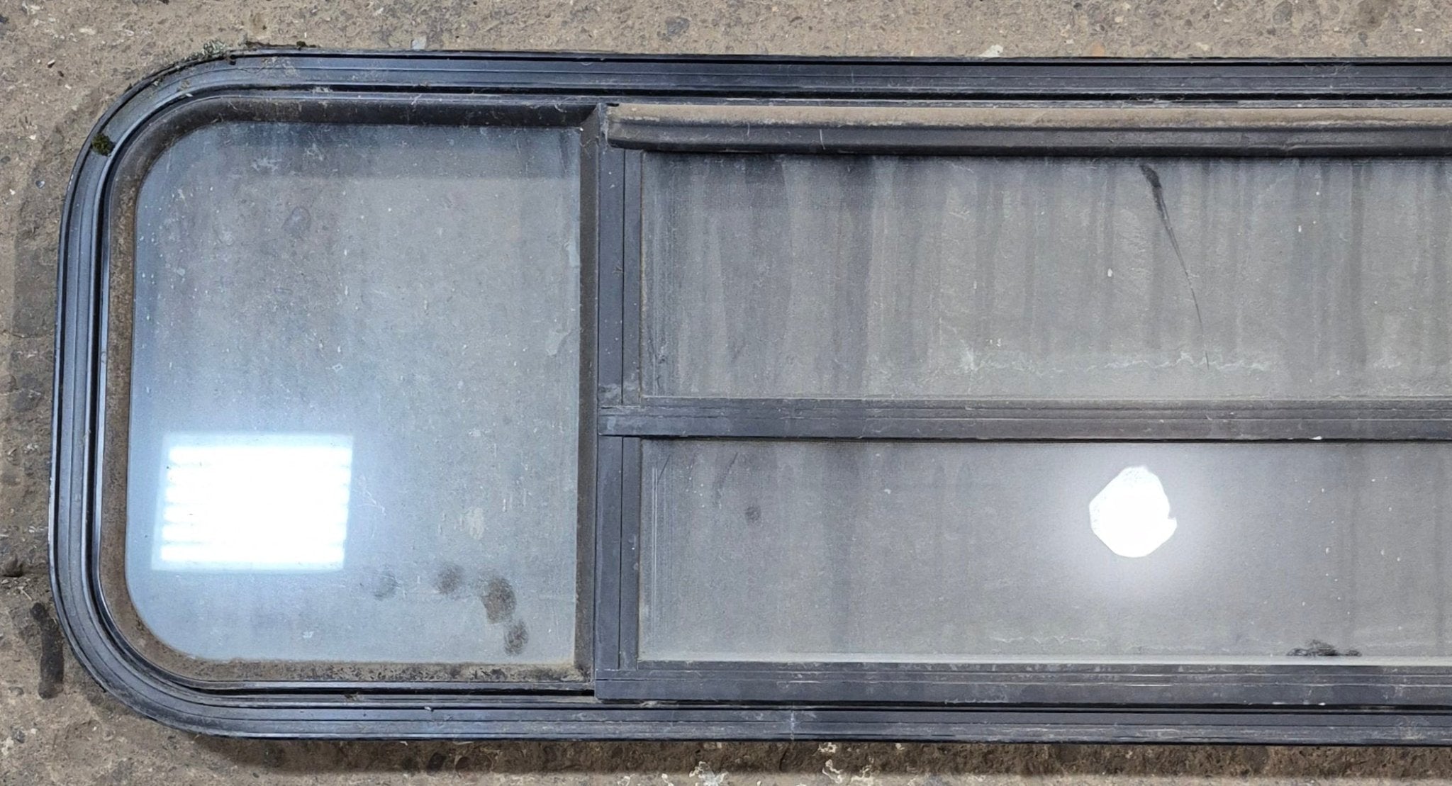 Used Black Radius Opening Window : 59 1/2" W x 14 3/4" H x 1 3/4" - Young Farts RV Parts