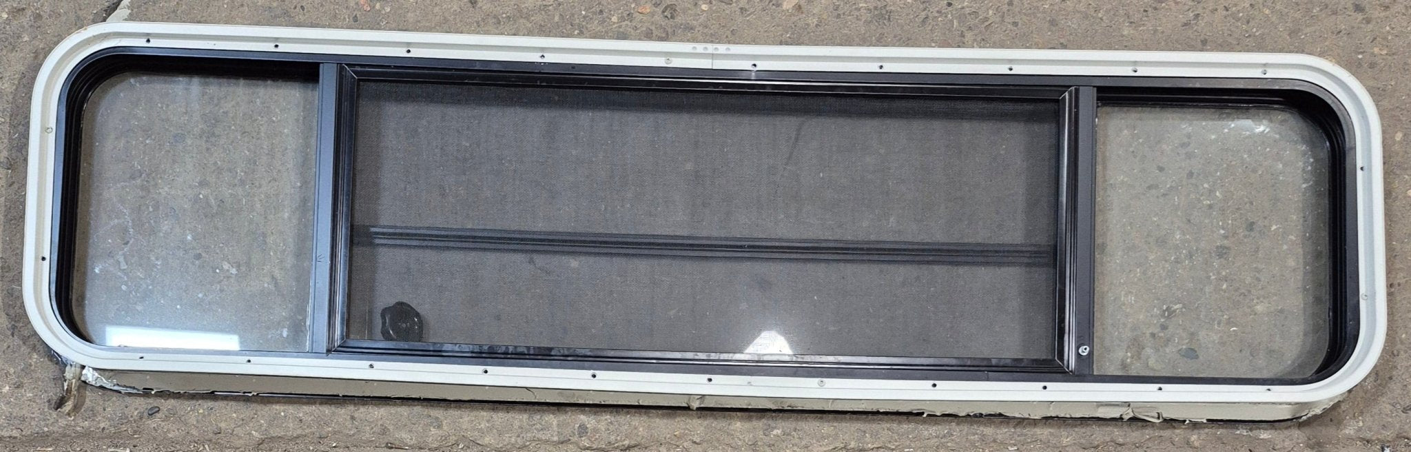 Used Black Radius Opening Window : 59 1/2" W x 14 3/4" H x 1 3/4" - Young Farts RV Parts