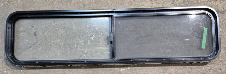 Used Black Radius Opening Window : 59 1/4" W x 14 1/2" H x 1 7/8" - Young Farts RV Parts