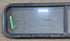 Used Black Radius Opening Window : 59 1/4" W x 14 1/2" H x 1 7/8" - Young Farts RV Parts