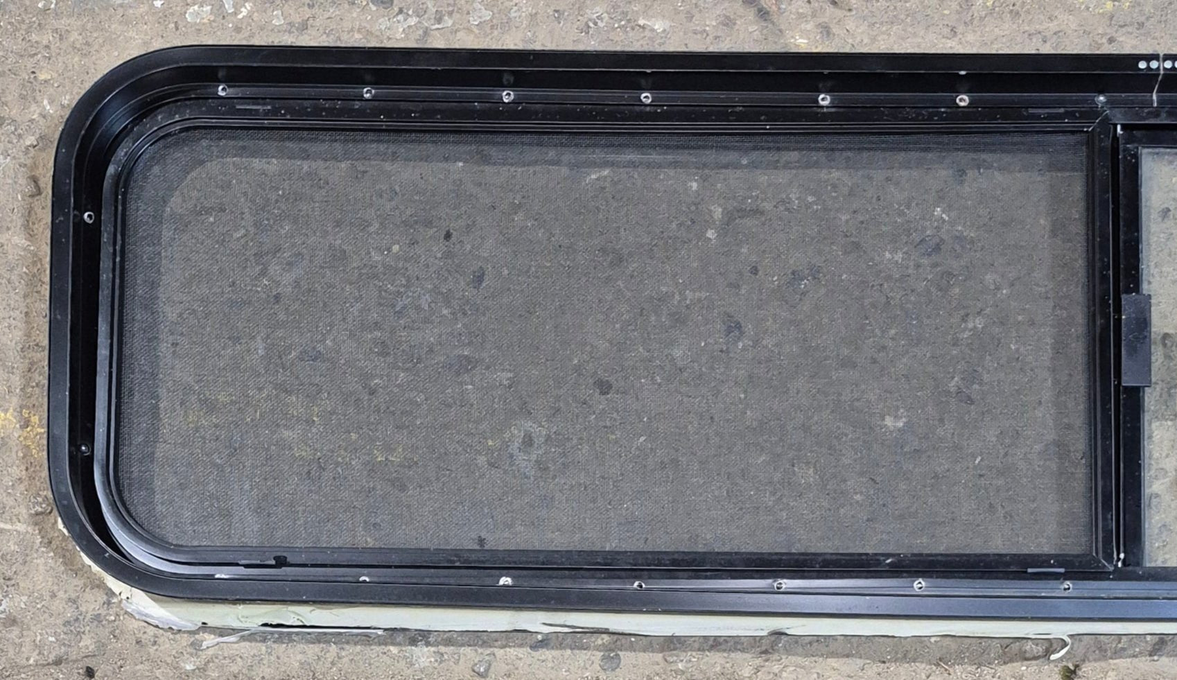 Used Black Radius Opening Window : 59 1/4" W x 14 1/4" H x 1 3/4" - Young Farts RV Parts