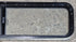 Used Black Radius Opening Window : 59 1/4" W x 14 1/4" H x 1 3/4" - Young Farts RV Parts