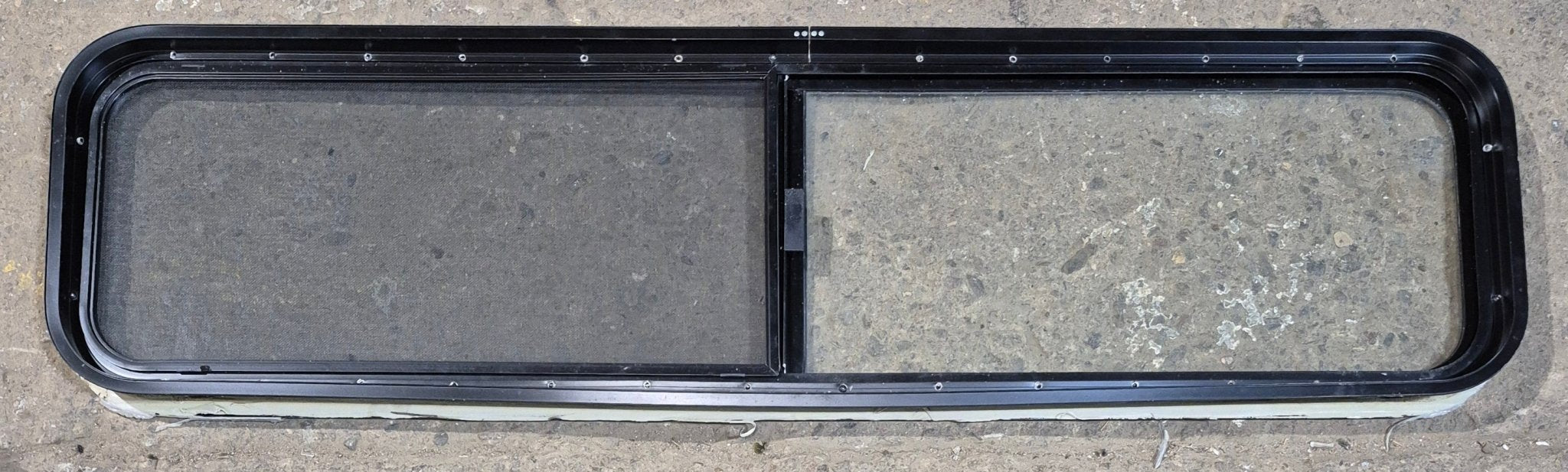 Used Black Radius Opening Window : 59 1/4" W x 14 1/4" H x 1 3/4" - Young Farts RV Parts