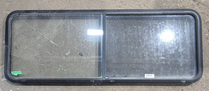 Used Black Radius Opening Window : 60 1/4" W x 21 3/4" H x 1 5/8" D - Young Farts RV Parts