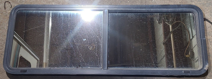 Used Black Radius Opening Window : 60" W x 21 1/2" H x 2" D - Young Farts RV Parts