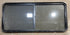 Used Black Radius Opening Window : 64 1/4" W x 28 3/4" H x 1 3/4" - Young Farts RV Parts
