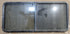 Used Black Radius Opening Window : 64 1/4" W x 28 3/4" H x 1 3/4" - Young Farts RV Parts