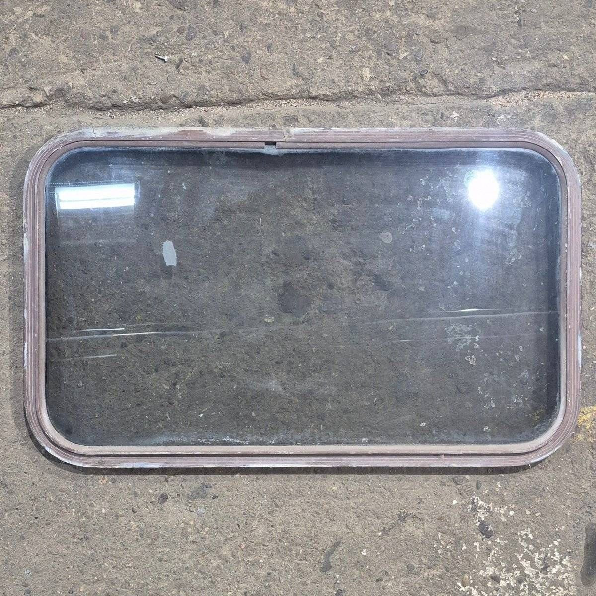 Used Brown Radius Non-Opening Window - 33 3/4" X 19 3/4" X 1 1/4" - Young Farts RV Parts