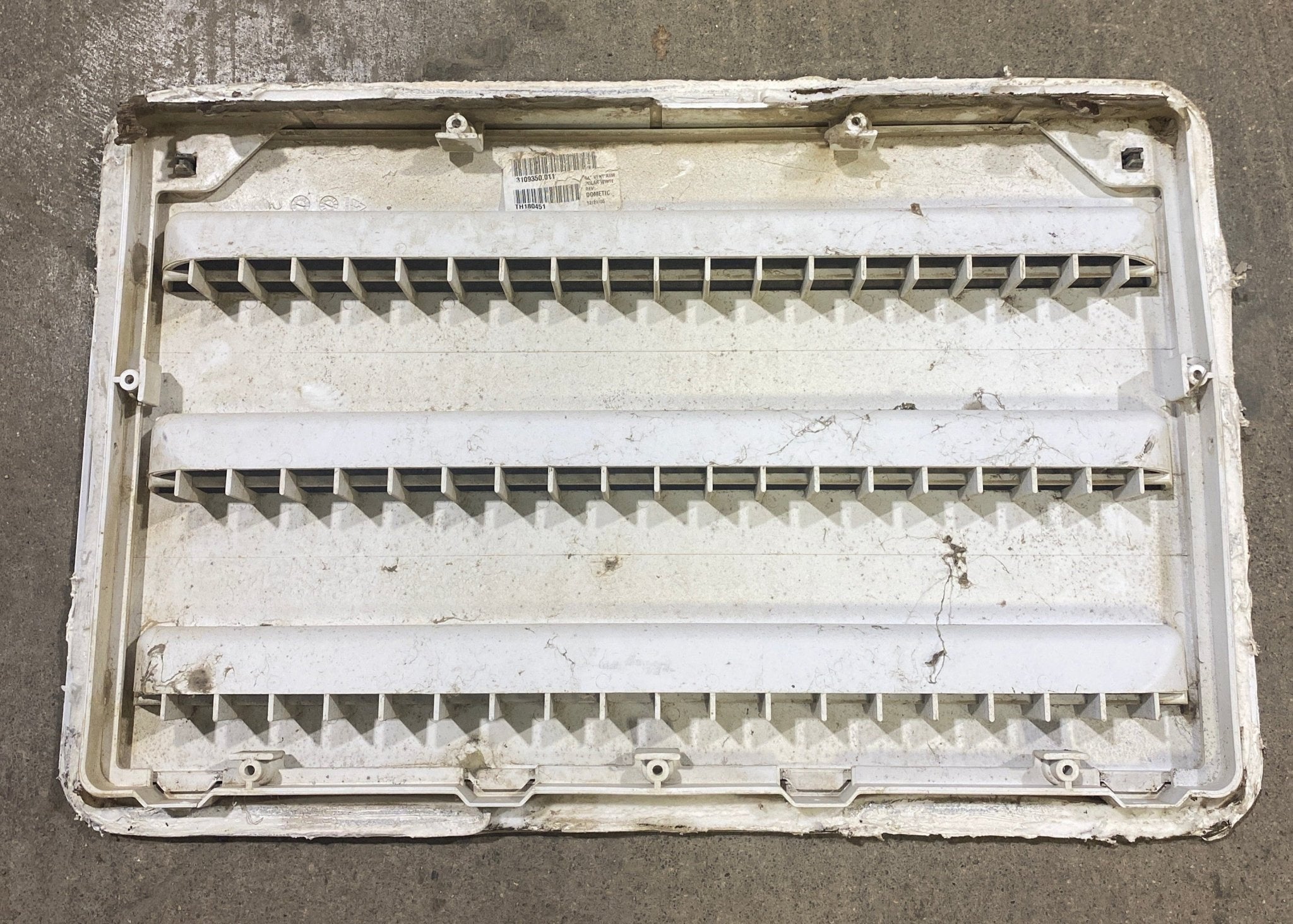 Used DOMETIC 3109350.011 - Yellowed Air Intake Side Refrigerator Vent - HAS FRAME - Young Farts RV Parts