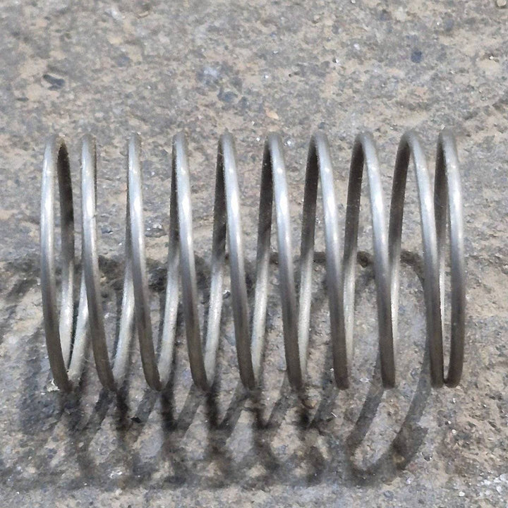Used Dometic Fridge Push Button Spring - 2932594019 - Young Farts RV Parts