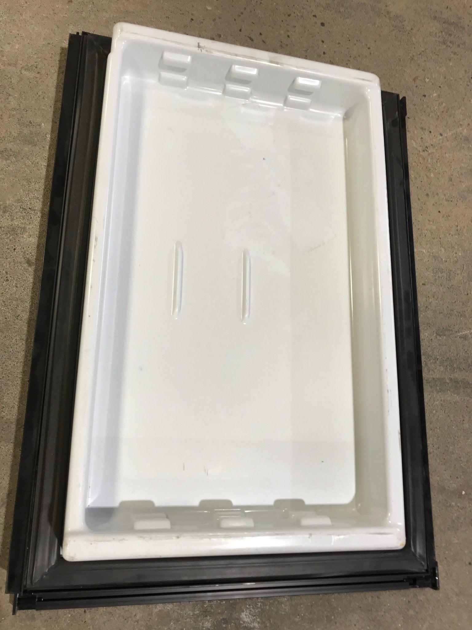 Used Dometic Refrigerator RH Freezer Door 4450008362 - 24" W x 16 3/4" H - Young Farts RV Parts