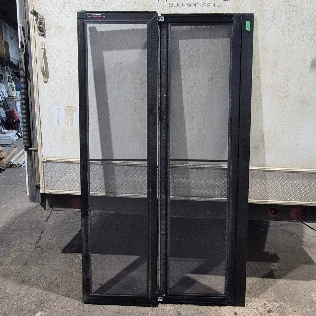 Used Lippert Toy Hauler Patio Wall Armor System Screen Door, Left Side - 82 1/4