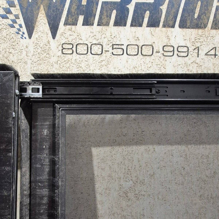 Used Lippert Toy Hauler Patio Wall Armor System Screen Door, Left Side - 82 1/4" X 47 5/8" - Young Farts RV Parts