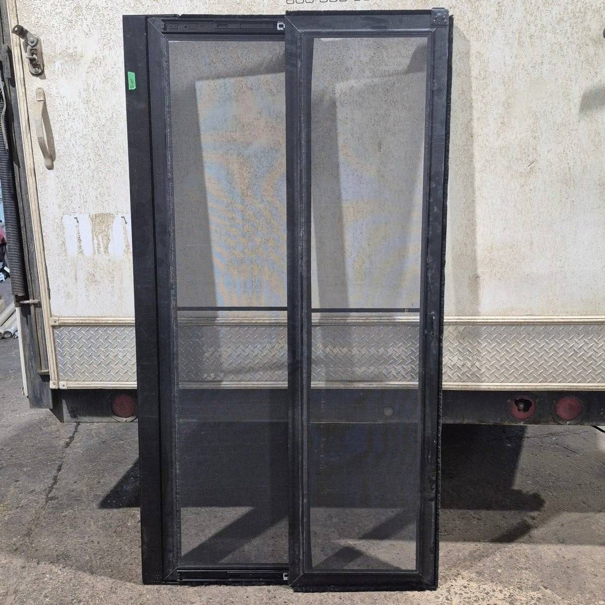 Used Lippert Toy Hauler Patio Wall Armor System Screen Door, Right Side - 82 1/4