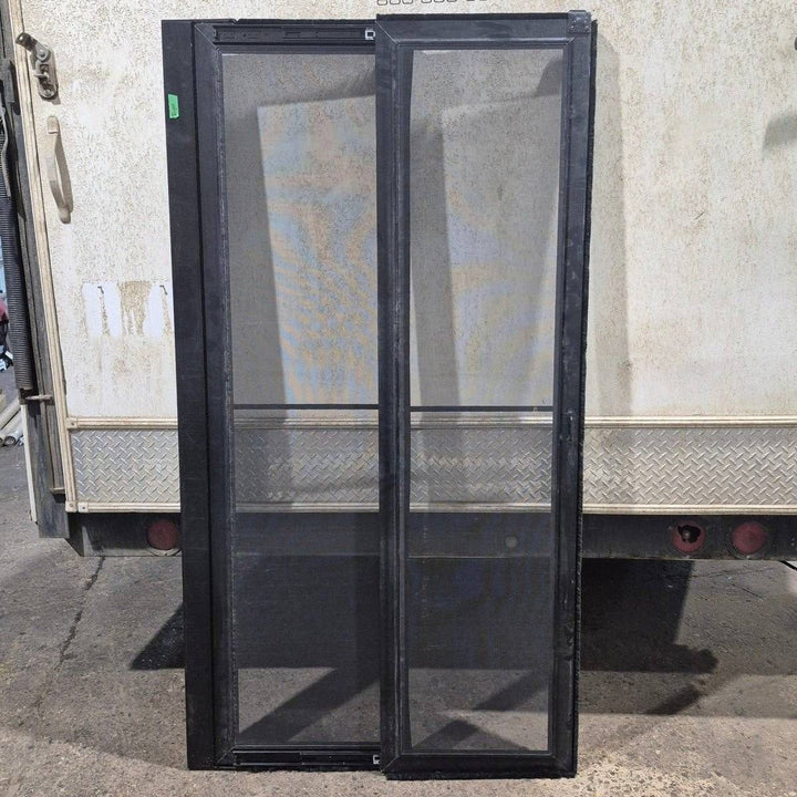 Used Lippert Toy Hauler Patio Wall Armor System Screen Door, Right Side - 82 1/4" X 47 5/8" - Young Farts RV Parts