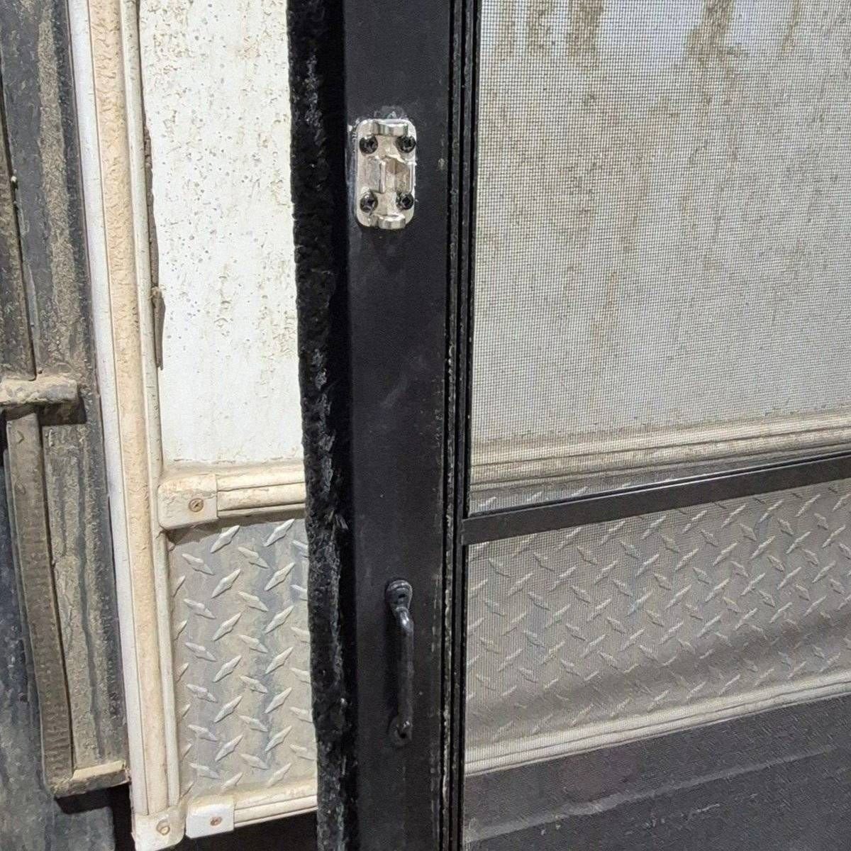 Used Lippert Toy Hauler Patio Wall Armor System Screen Door, Right Side - 82 1/4" X 47 5/8" - Young Farts RV Parts