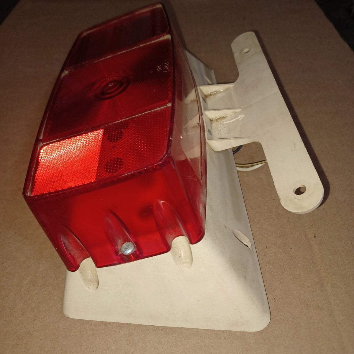 Used Microflex SAE-AILR(2) ST-72 D.O.T Taillight Assembly, With License Plate Bracket - Young Farts RV Parts