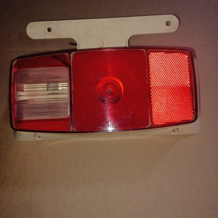 Used Microflex SAE-AILR(2) ST-72 D.O.T Taillight Assembly, With License Plate Bracket - Young Farts RV Parts