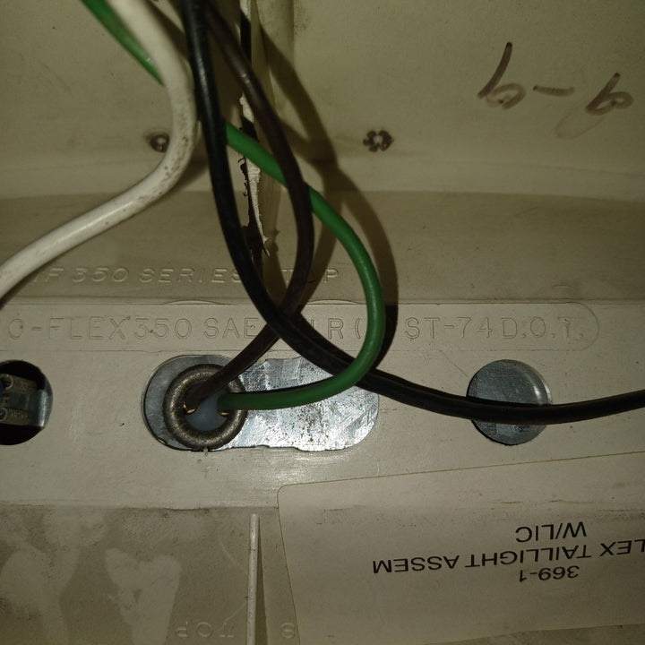 Used Microflex SAE-AILR(2) ST-72 D.O.T Taillight Assembly, With License Plate Bracket - Young Farts RV Parts