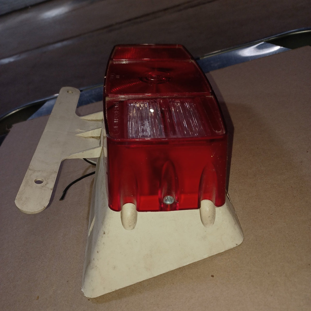 Used Microflex SAE-AILR(2) ST-72 D.O.T Taillight Assembly, With License Plate Bracket - Young Farts RV Parts